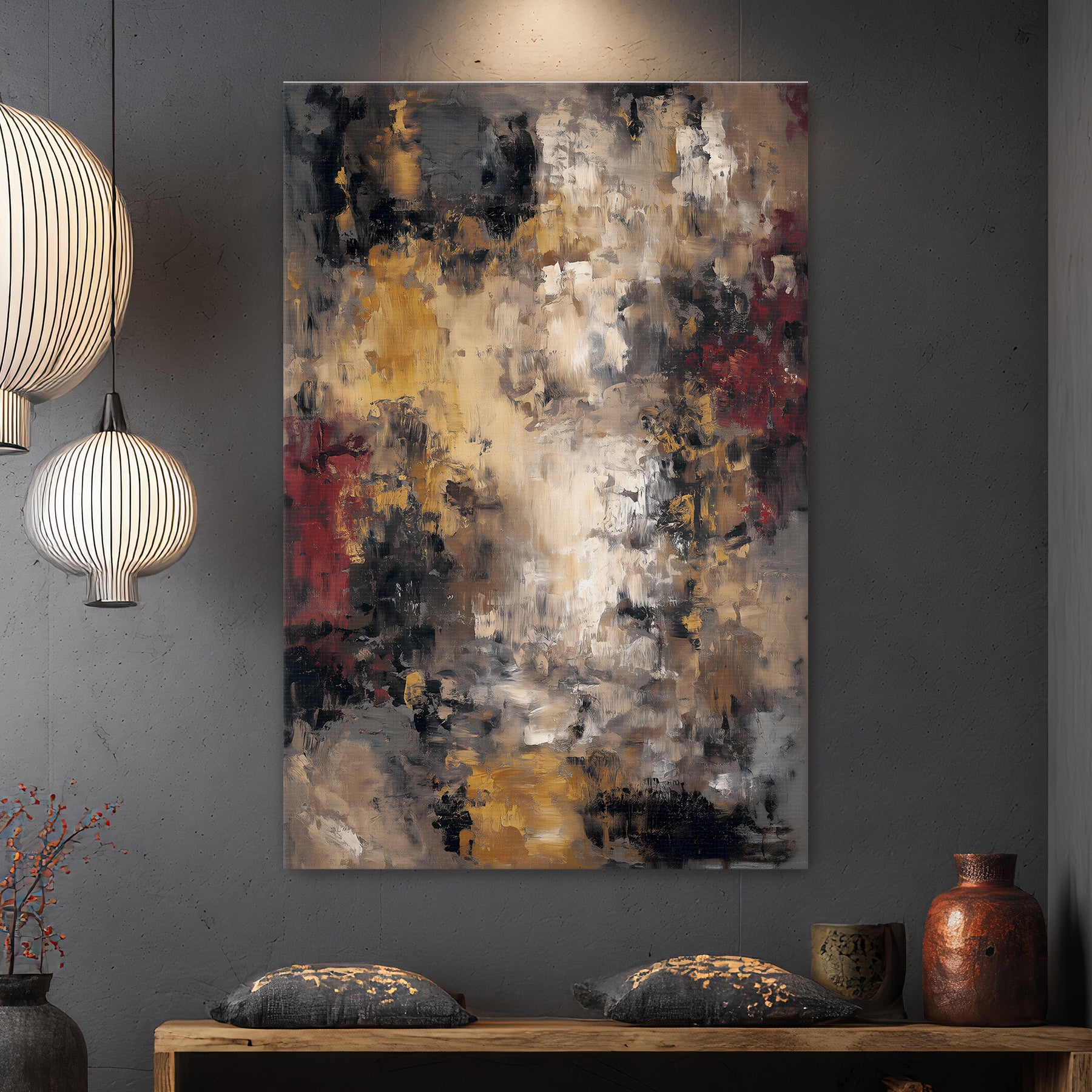 Abstract painting on a gray wall with decorative elements below.