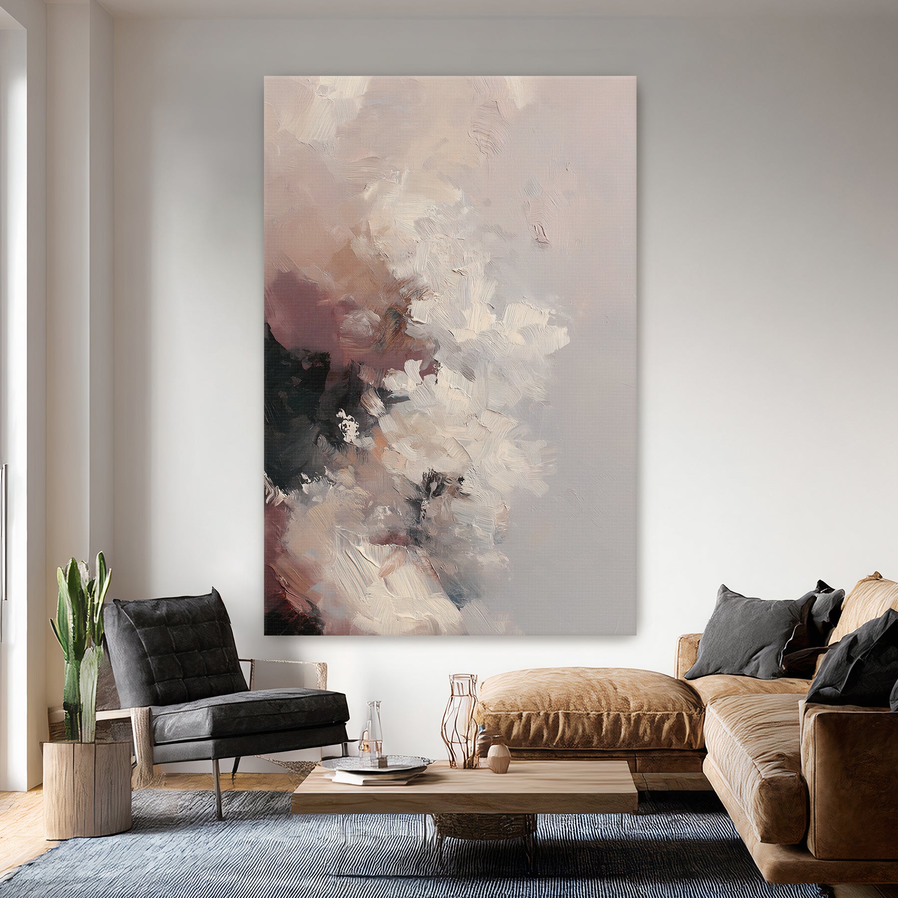 Living room with a large abstract painting on the wall, brown sofa, and gray armchair.