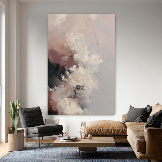 Living room with a large abstract painting on the wall, brown sofa, and gray armchair.