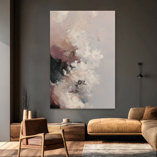 Abstract painting on a gray wall above a brown sofa and wooden side table.