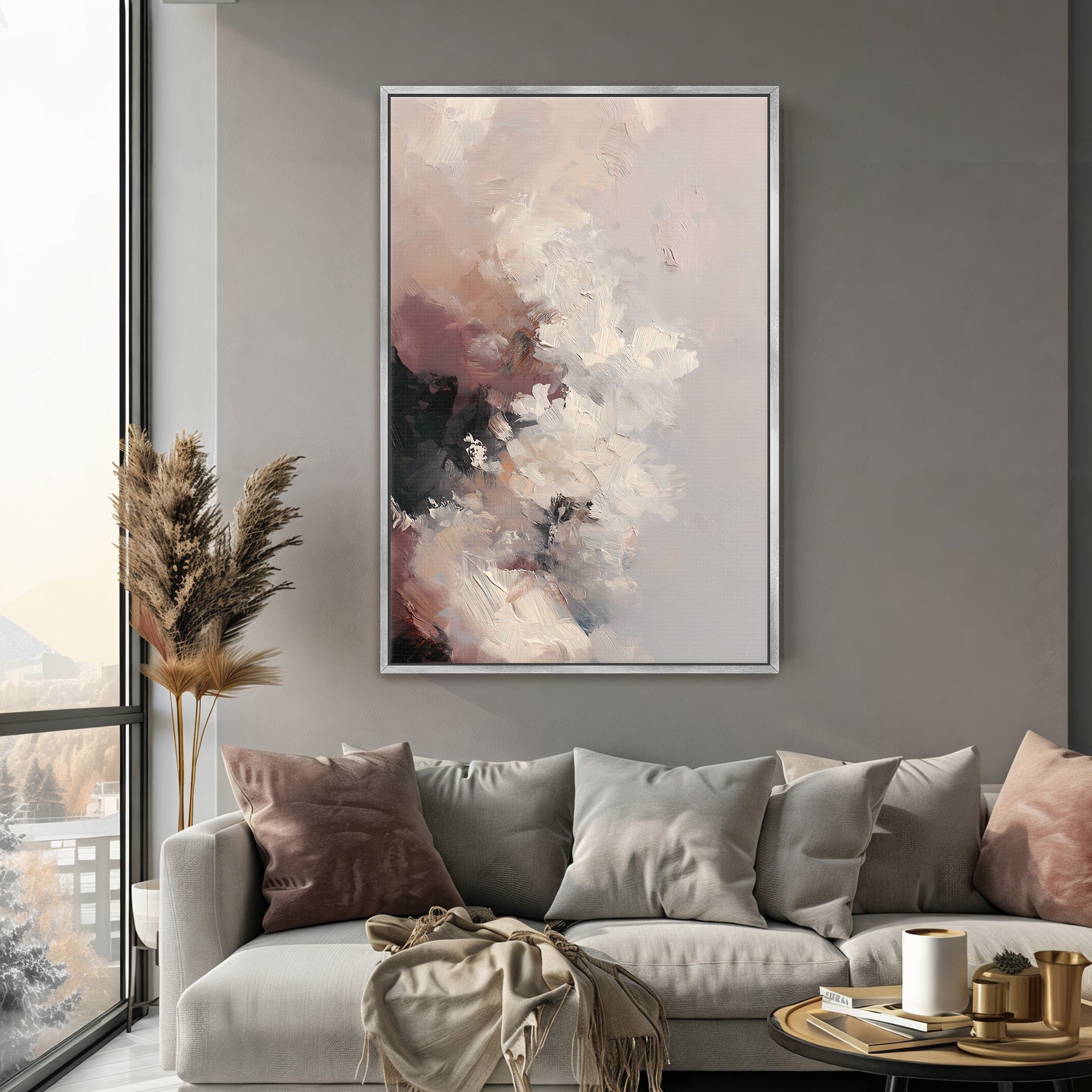 Living room with a gray sofa, decorative pillows, and a large abstract painting on the wall.
