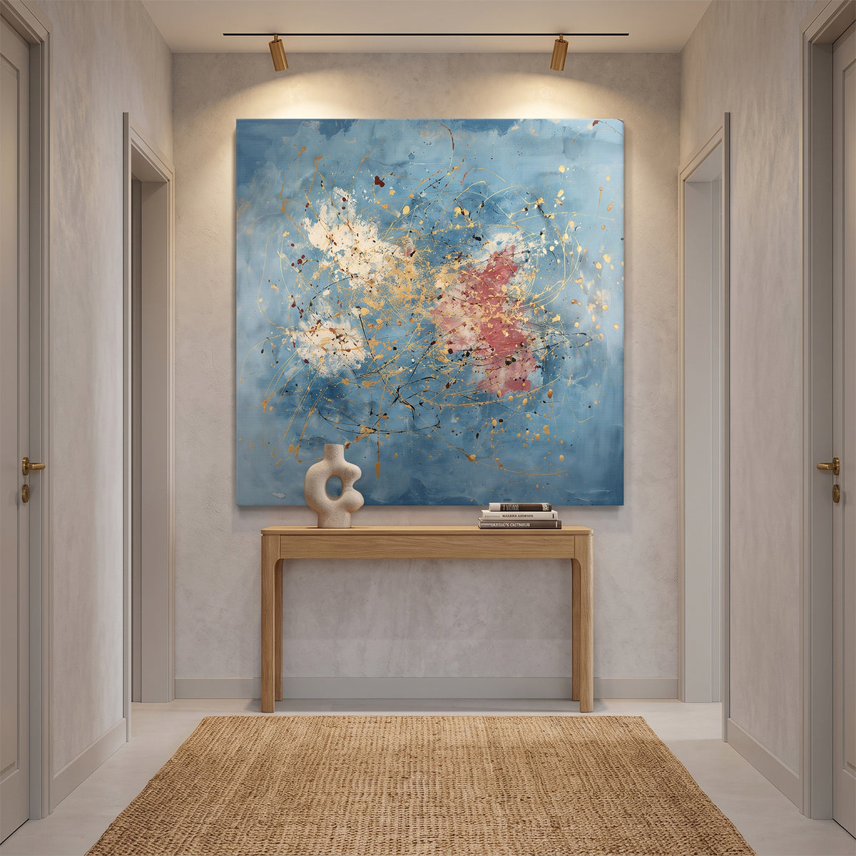 Gallery-wrapped stretched canvas with gold drip splatter and rose accents on a soft cerulean blue ground — expressive artistic wall art ready to hang